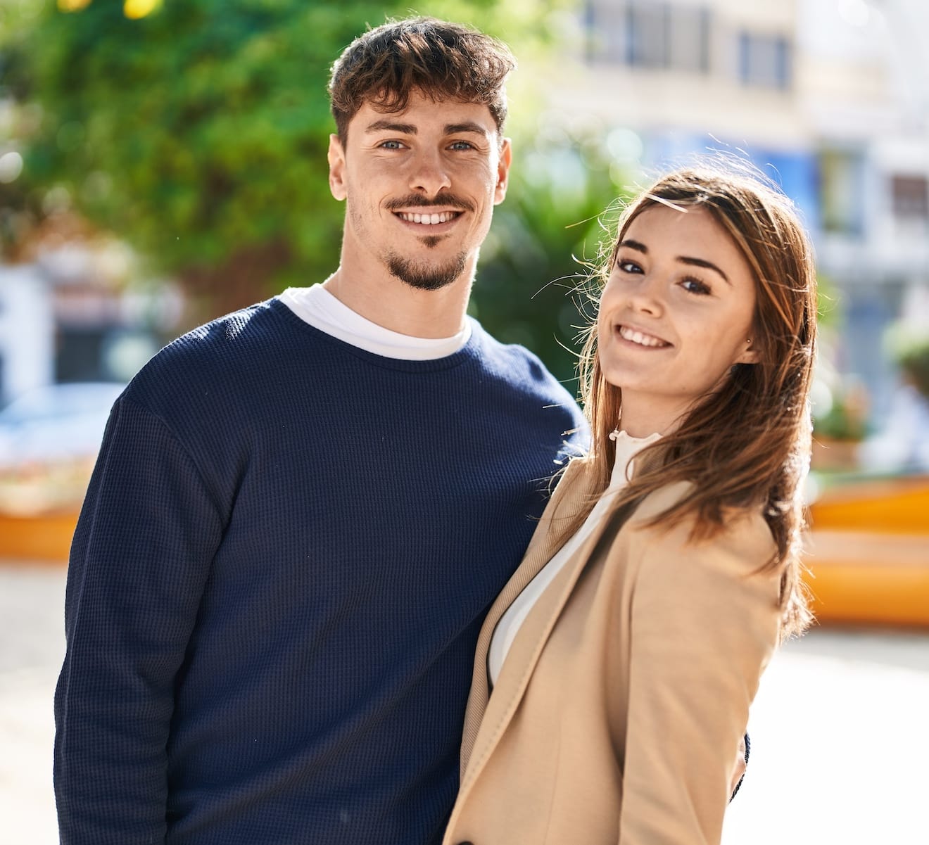 Man and woman couple hugging each other at park Man and woman couple hugging each other at park